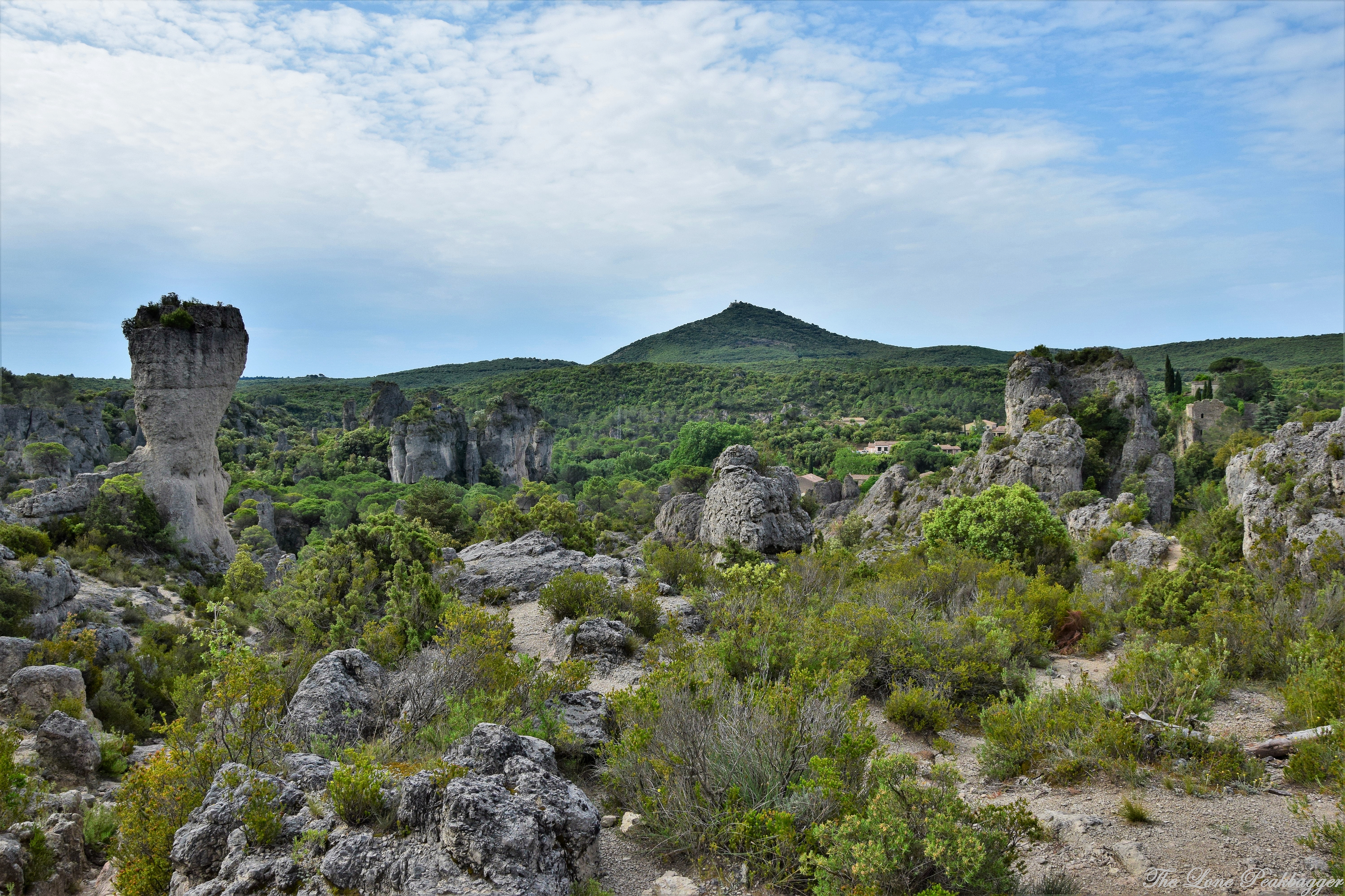 The scenery of the Cirque de Mourèze with the very recognisable Pic de Vissou (480m) in the distance